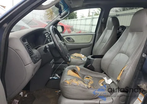 2001 Mazda Tribute Lx z USA, uszkodzony, nr VIN 4F2CU08111KM23528